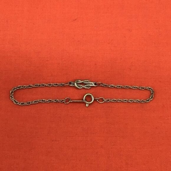 Avon Jewelry - Avon Gold Tone Rope Links with Knot 6.25" Bracelet